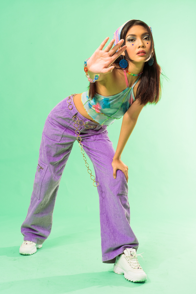 Portrait of a Young Woman in 90s Fashion
