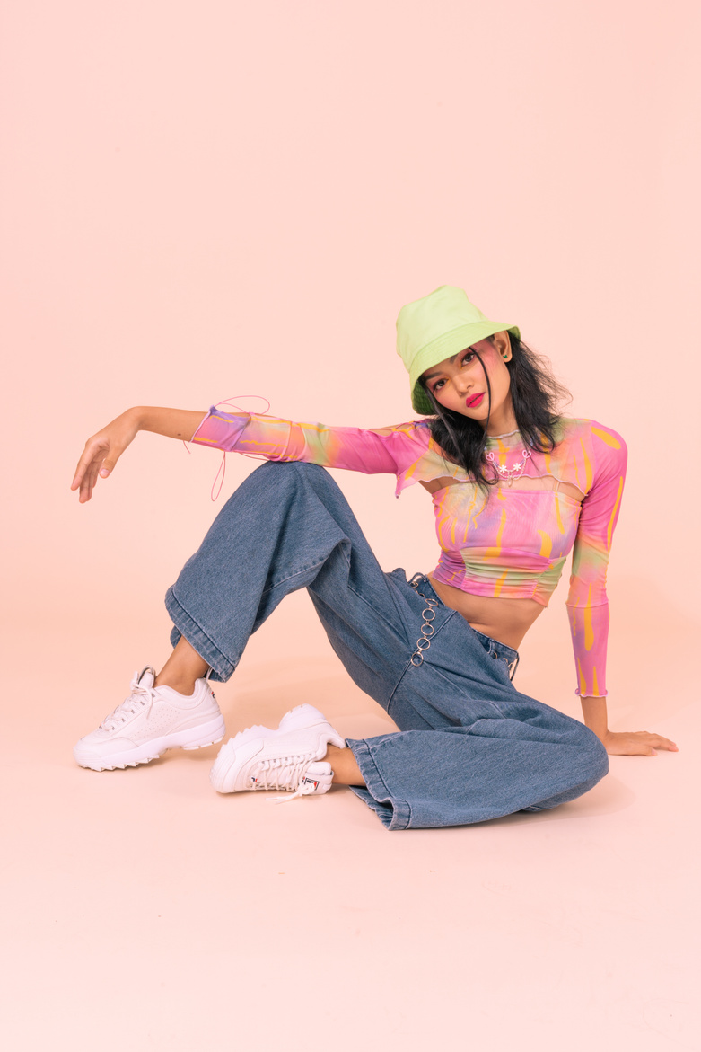 Portrait of a Young Woman in 90s Fashion